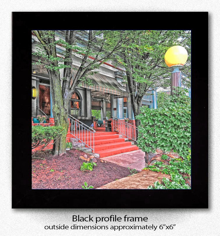 Framed Roycroft Inn Ceramic Coaster print with black profile frame, showcasing East Aurora architecture, frame measures approximately 6x6 inches.