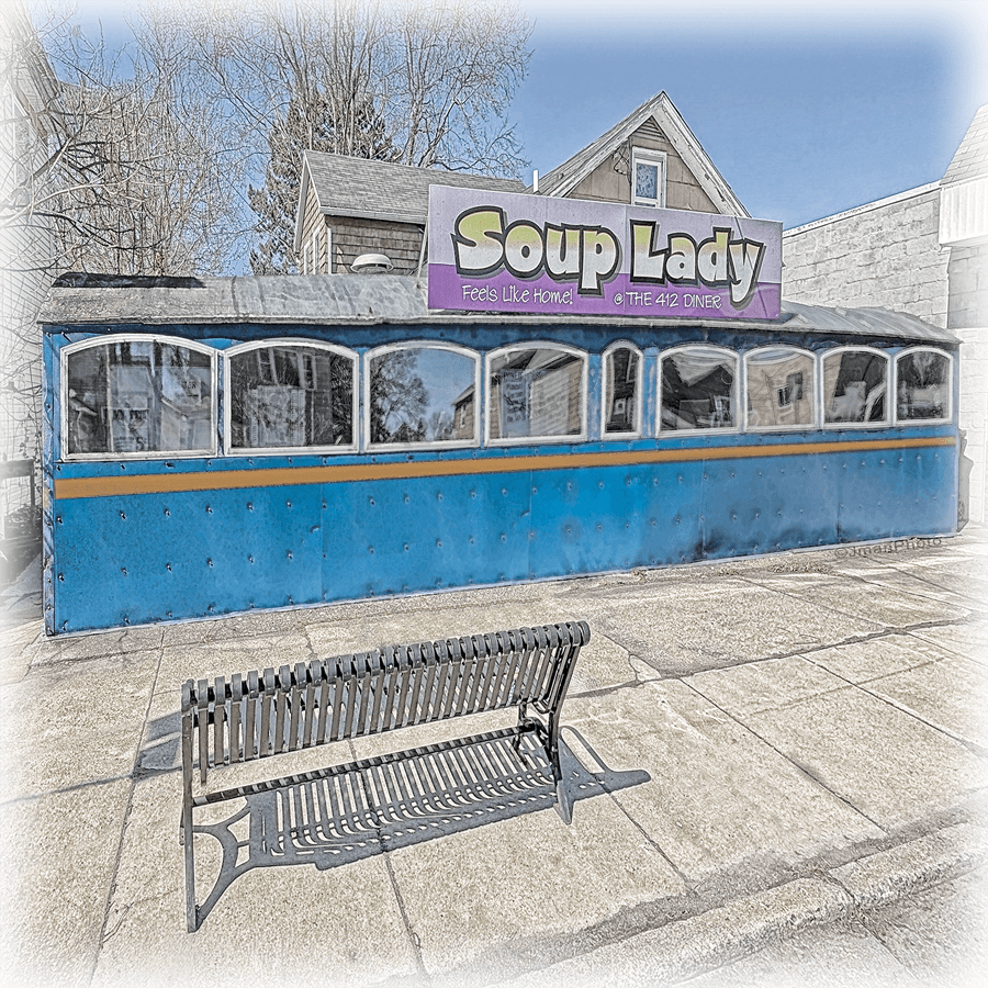 Soup Lady Diner photo art print by JMan Photography featuring a vintage blue diner exterior with a purple sign, ideal for ceramic wall art or coaster decor.