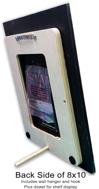 Back side of 8x10 Larkinville Diner print includes wall hanger, hook, and dowel for shelf display, ideal for versatile home decor setup.