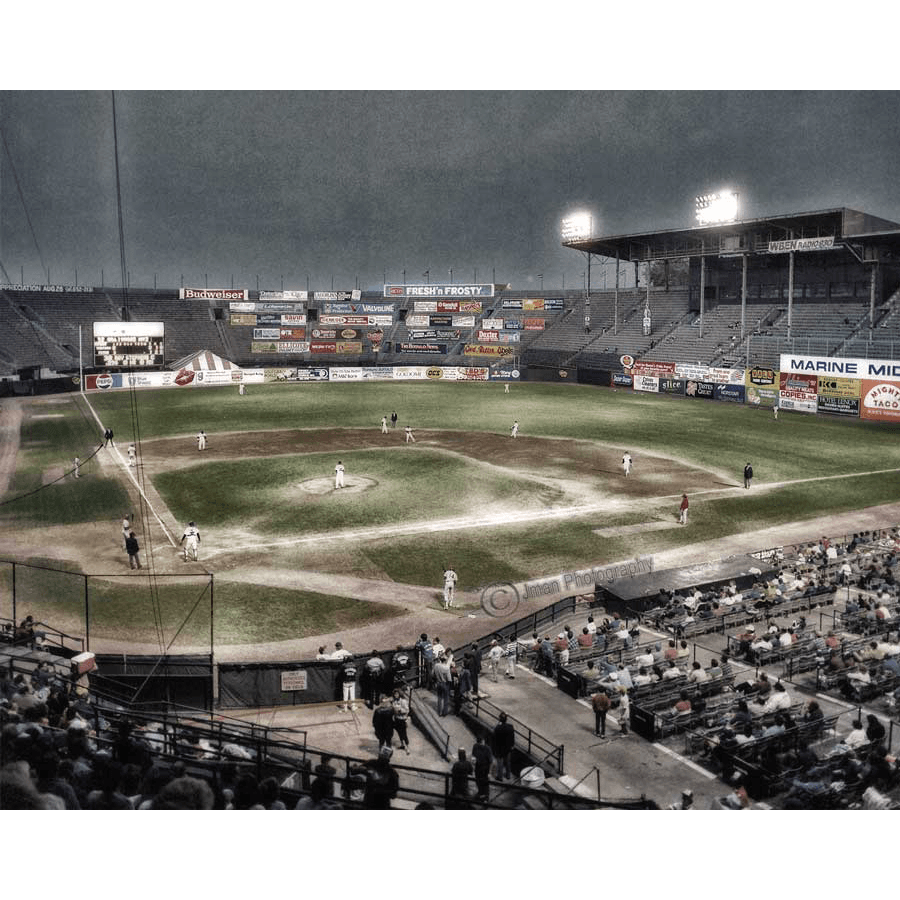 Bison Baseball Magnet - War Memorial features a vintage game scene at night with stadium lights and crowd, perfect for sports-themed decor.