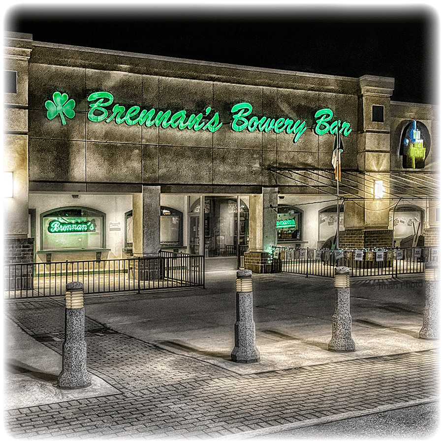 Close-up of Brennan's Bowery Bar Coaster showing detailed night photography of the bar's facade, ideal for Buffalo-themed home bar decor.