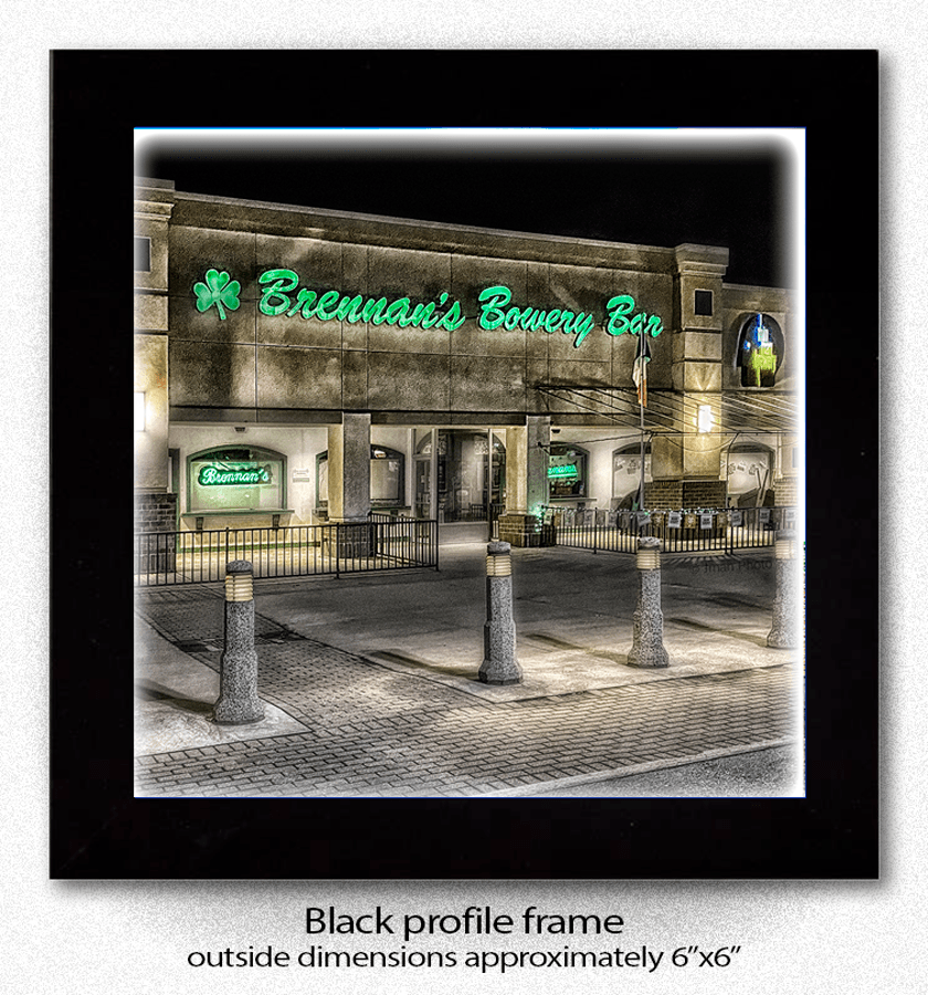 Framed Brennan's Bowery Bar Coaster print with black profile frame, perfect for displaying Buffalo landmark art in home or office settings.