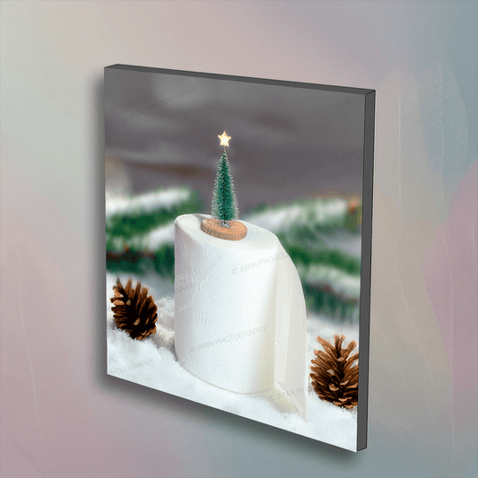 Christmas Toilet Paper wall art featuring a festive roll with a mini Christmas tree topper and pinecones, perfect for whimsical bathroom decor.