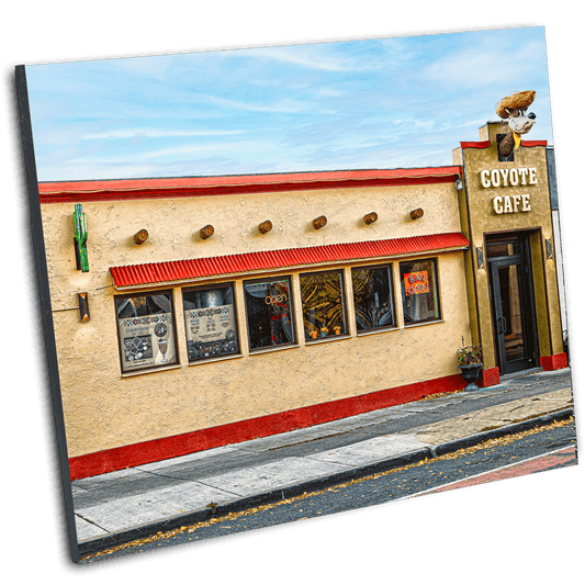 Coyote Cafe Buffalo Photography by Jman displayed in a tilted print format, showcasing vibrant architectural detail for visual artwork collectors.