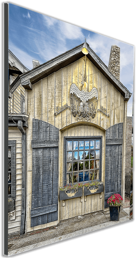 Framed Eagle House Williamsville NY print with angled view, showcasing detailed architecture and vibrant colors for Buffalo-themed wall art.