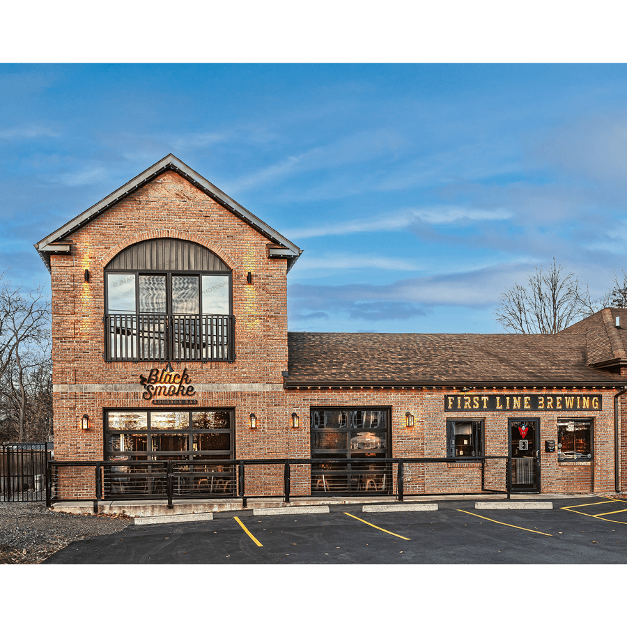 Buffalo Brewery Photos - First Line Brewing exterior at sunset, showcasing brick facade and signage. Ideal wall art for brewery lovers and collectors.