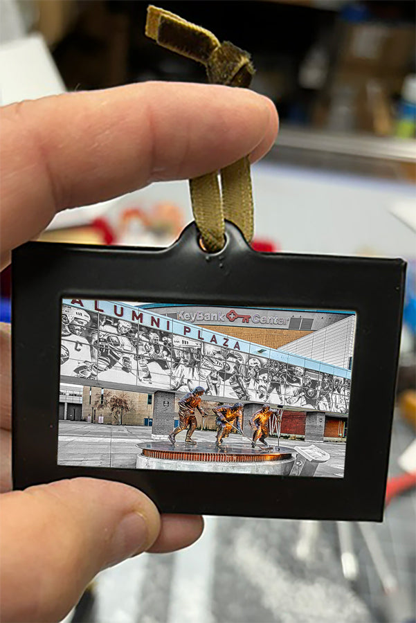 Mini Framed Artwork Ornament - Bill Dziejman's Art showing KeyBank Center's Alumni Plaza with statues, ideal for Buffalo sports fans.