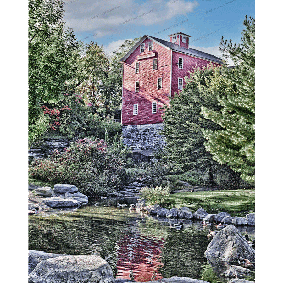 Glen Park Magnet - Enhance Your Space | Durable Acrylic featuring a red historic mill beside a serene pond with ducks and lush greenery.