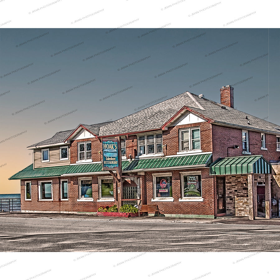 Frontal view of Hoaks Restaurant building with green roof and brick exterior, used in the Steampunk Table Lamp design for unique home lighting.