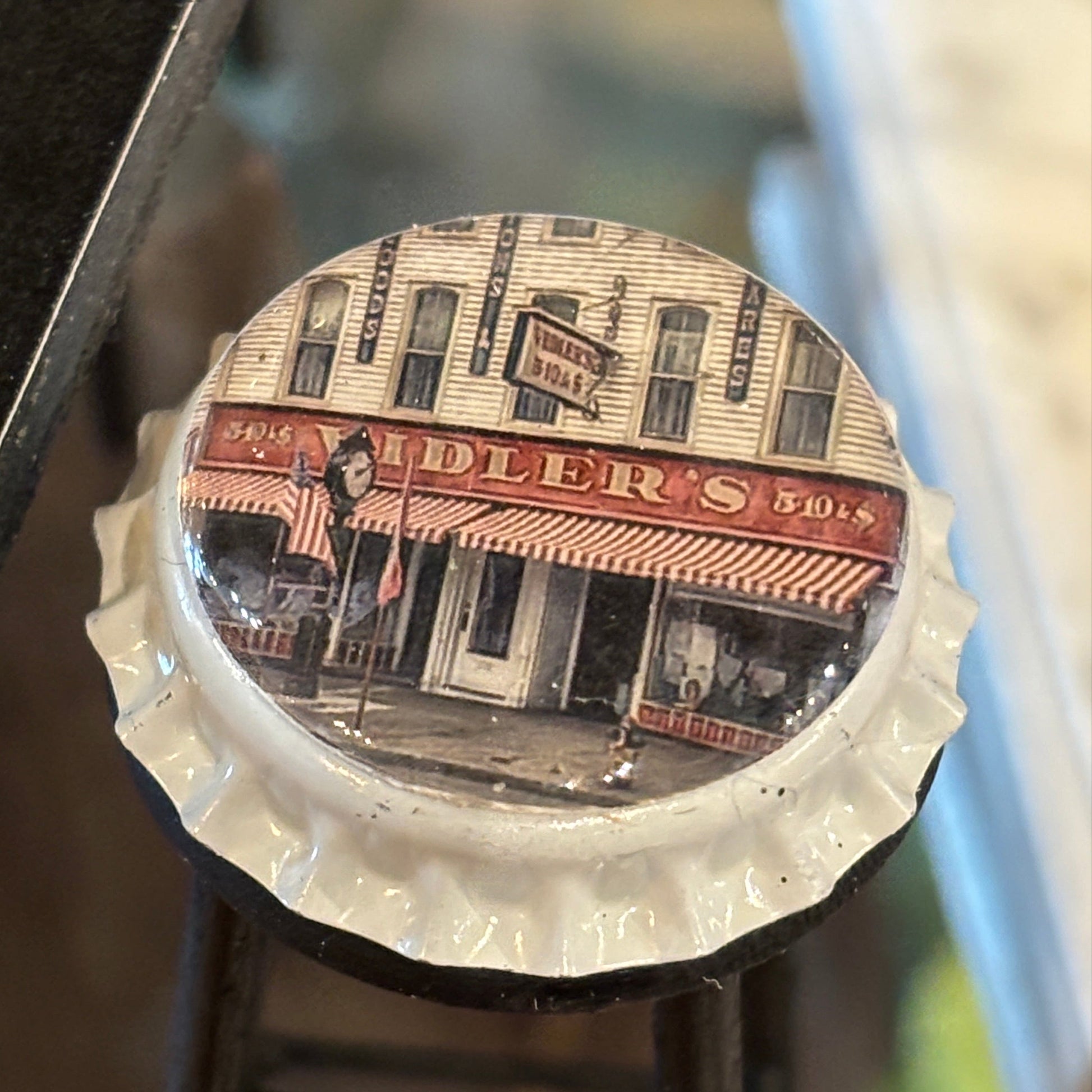 Vidler's Stool - Bottle Cap Bar mini table features a vintage-style wooden top with a printed image of Vidler's storefront in East Aurora.