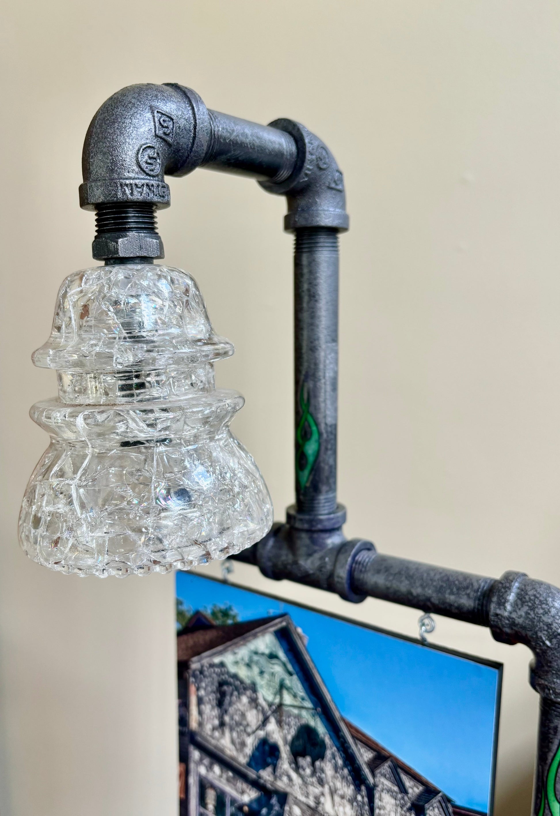 Glass insulator light fixture on Old Pink Dive Bar-Steampunk Lamp-Buffalo NY Photo/lamp-Jman Photo with rustic industrial pipe detailing.