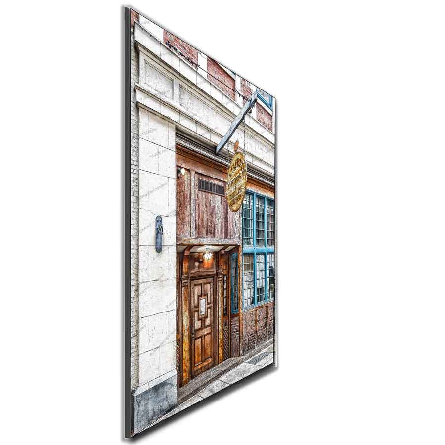 Side view of Lafayette Tap Room Art print mounted on wall panel. High-quality Buffalo landmark decor available in 5 sizes for home or office display.