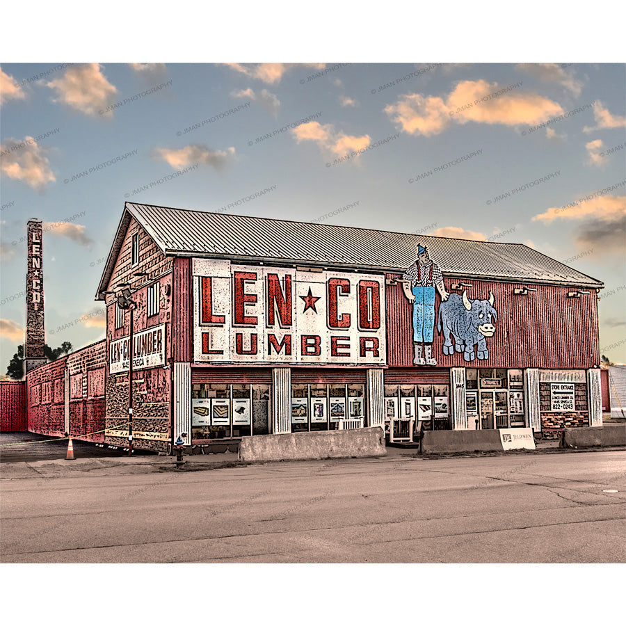 Len-Co Lumber Buffalo NY photo by Bill Jman-Jman featuring historic red building with vintage signage and Paul Bunyan mural at sunset.