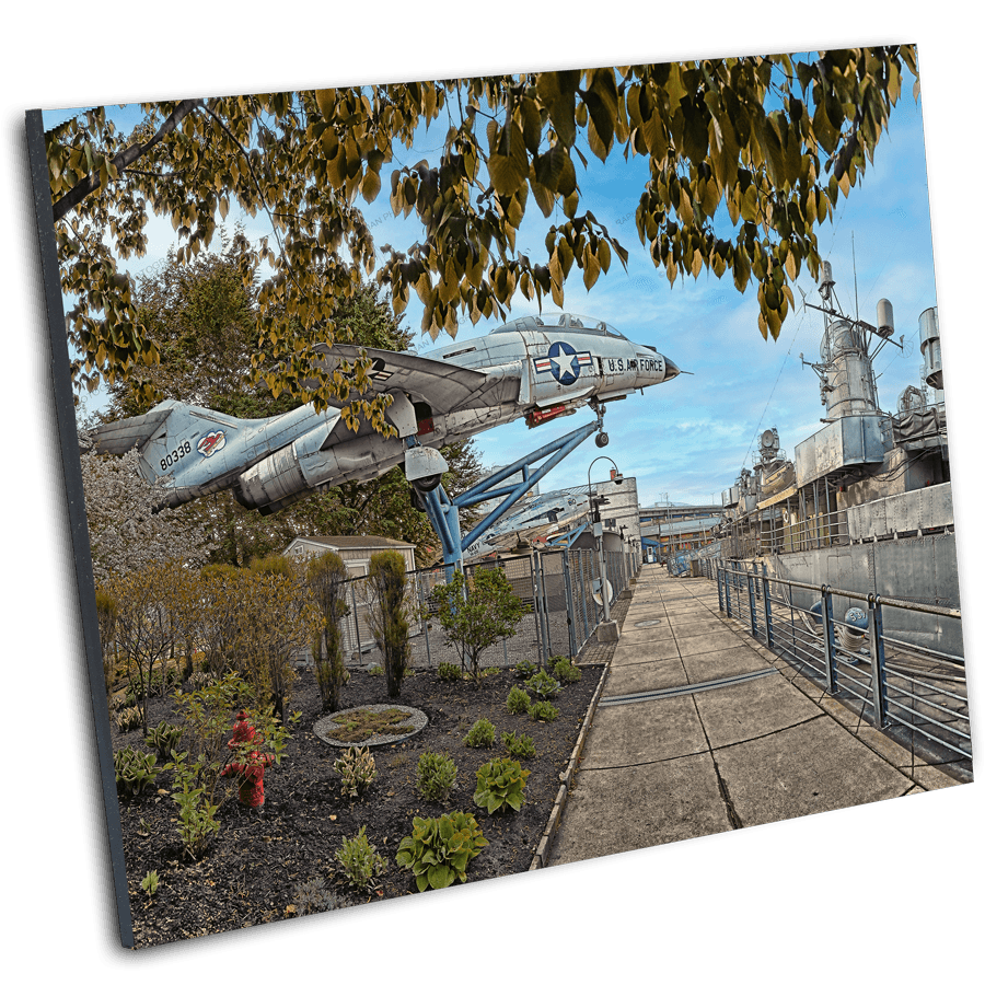 Angled view of Naval Warriors - USS The Sullivans photo print with jet and ship at Buffalo Naval Park. Perfect for nostalgic and historical wall art.