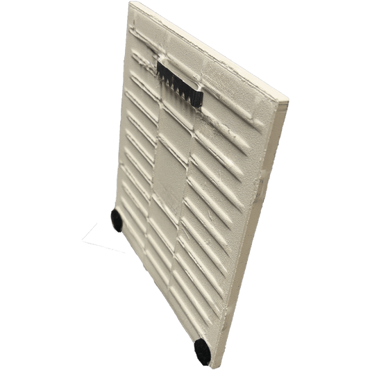 Angled view of Chocolate Mousse ceramic tile trivet showing back with metal hanger and felt pads, designed for wall mounting or countertop use.