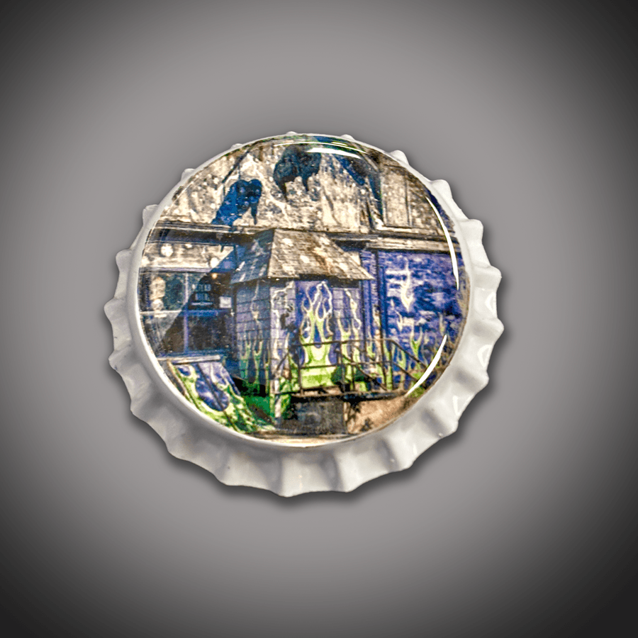 Bar Stool - Old Pink Bar Bottle Cap with graffiti-style artwork of a bar scene, mounted on a wooden black stool base. Ideal for bar-themed furniture décor.