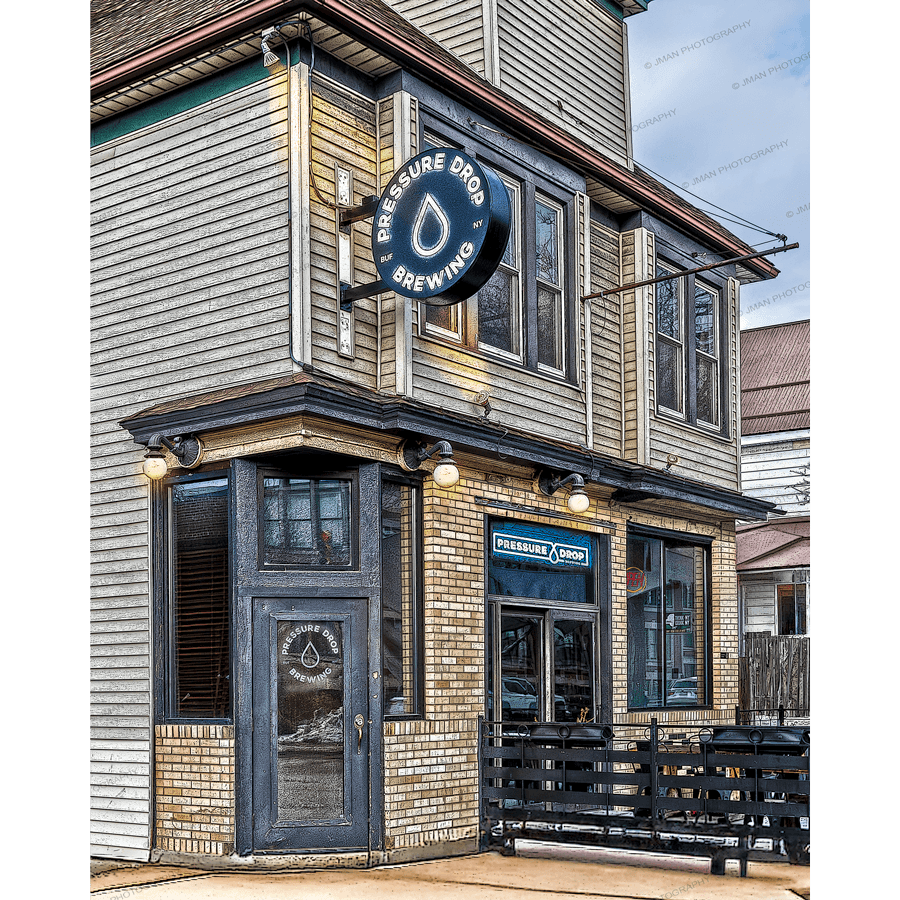 Pressure Drop Brewing Print - Craft Beer Photography featuring a rustic Buffalo nano-brewery exterior with vintage signage and brick facade. Ideal for home bar or kitchen decor.