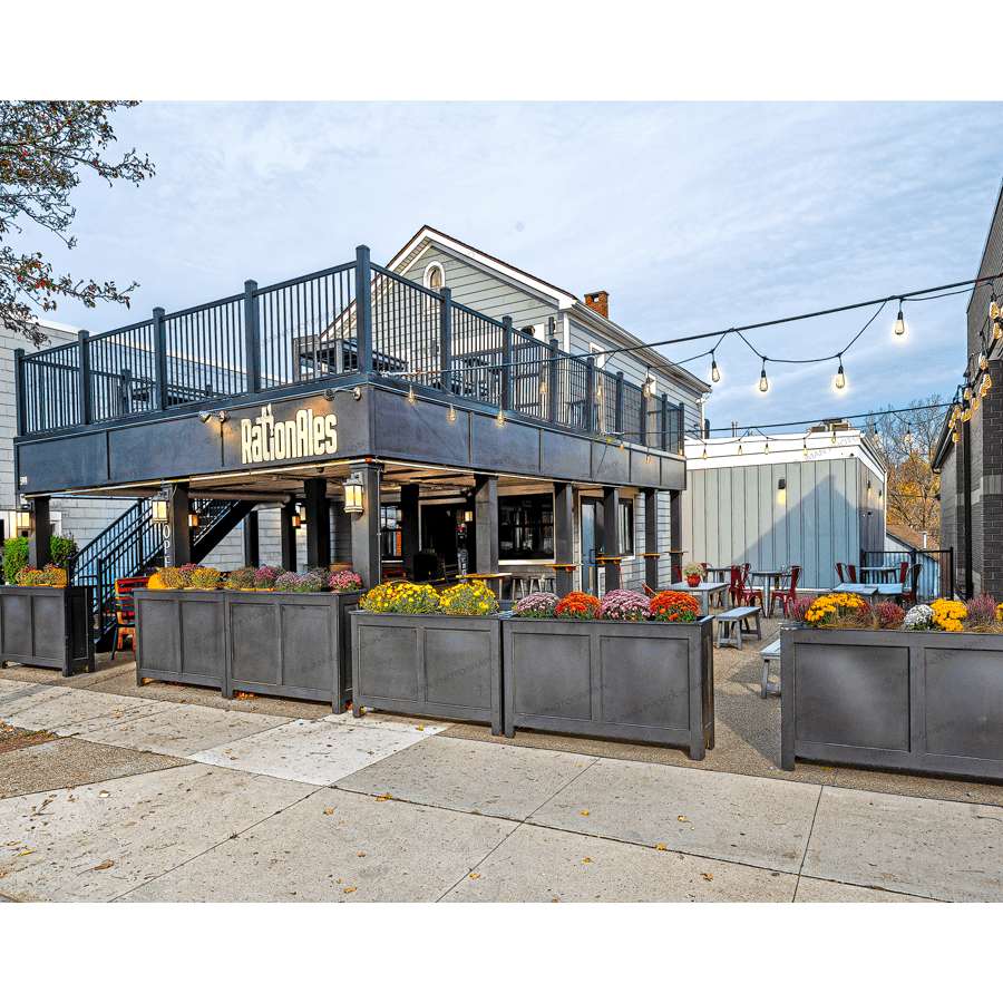 RationAles - Buffalo Western NY Photo Art featuring a vibrant brewery patio with string lights and colorful flowers, perfect for home or bar decor.