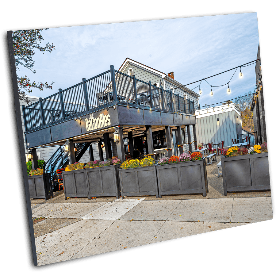 RationAles - Buffalo Western NY Photo Art featuring a vibrant brewery patio scene with string lights and floral decor in Amherst-Williamsville area.