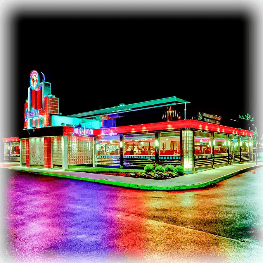 Silver Diner - Wellsboro diner photo art by JMan Photography featuring a neon-lit retro diner at night. Unique print for home or kitchen decor.