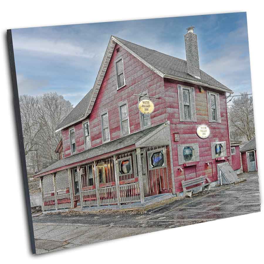 Angled view of Water Valley Inn Print - Vintage Charm highlights the nostalgic Hamburg landmark, perfect for home or office vintage wall art.