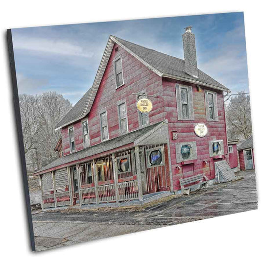 Angled view of Water Valley Inn Print - Vintage Charm highlights the nostalgic Hamburg landmark, perfect for home or office vintage wall art.
