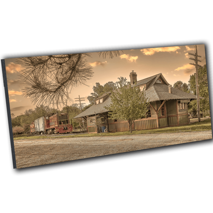 Mounted Williamsville Train Station Art - Depot-Locomotive print with angled view, showcasing historic charm for home or office wall display.