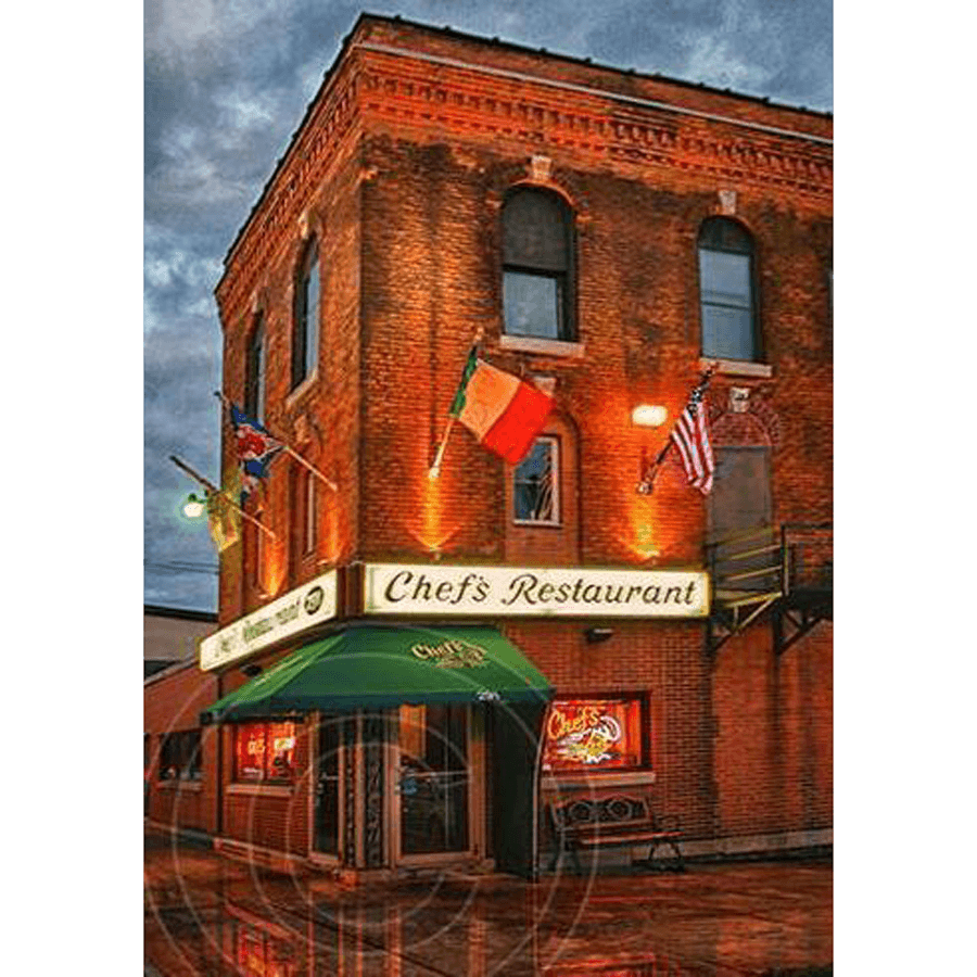 Italian Restaurant Magnet featuring Chef's Restaurant building with flags and neon sign, 2.25x3.5 inch scratch-resistant acrylic decor piece.