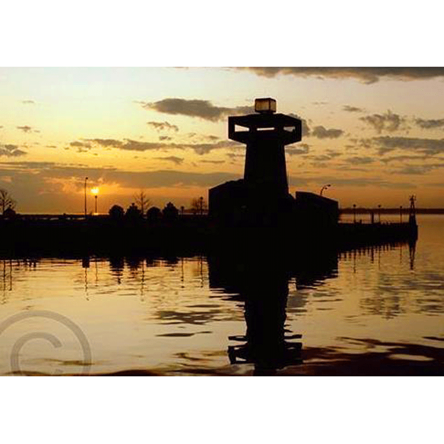 Erie Basin Marina Magnet - Acrylic Magnet featuring a sunset silhouette of the iconic tower reflecting on calm waters, ideal for Buffalo landmark collectors.