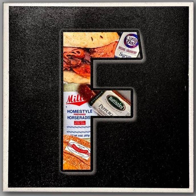Letter F coaster from Bflo Flavor Coasters set, highlighting Buffalo staples like horseradish, roast beef, and pepperoni on a ceramic surface.