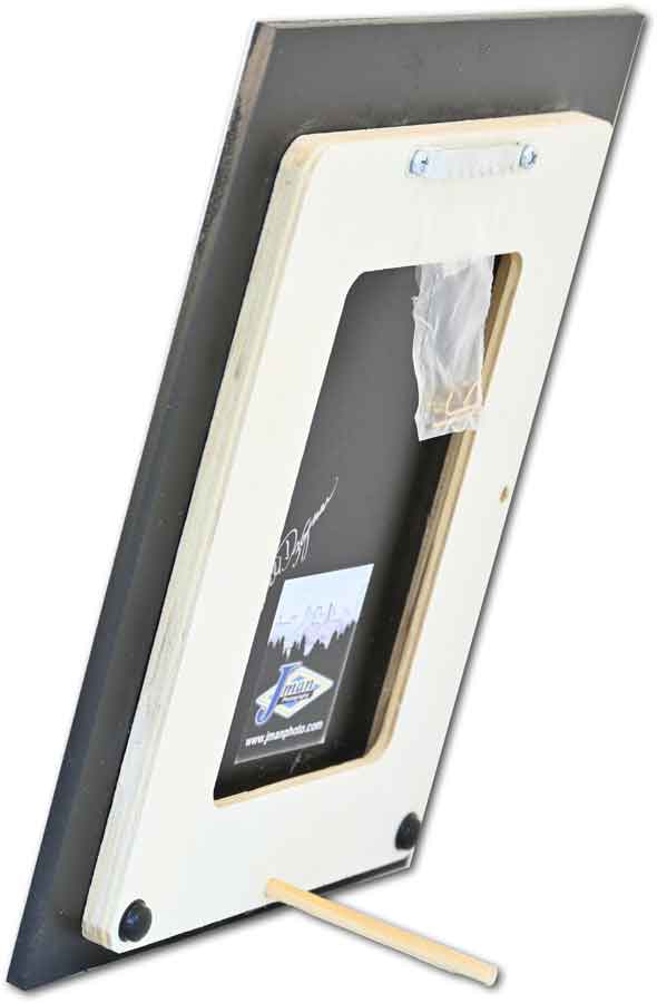 Back view of framed rustic décor artwork titled 'Outhouse - Half Moon' with built-in stand and wall mount. Perfect for home and garden display.