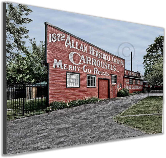Mounted print of Allan Herschell Carrousel Company building, ideal for home decor showcasing antique amusement ride history.