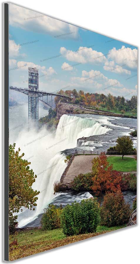 Side view of American Falls in Fall - Niagara Photography wall art by Jman Artwork, highlighting vivid fall colors and waterfall detail.