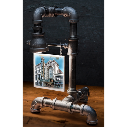 Custom pipe lamp with black industrial piping and a hanging tile image of a historic Buffalo theater, perfect for home decor or gift