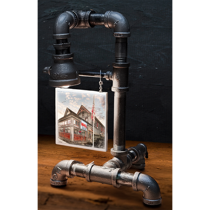 Industrial-style custom pipe lamp with black metal piping and a hanging tile image of a historic building, perfect for home decor