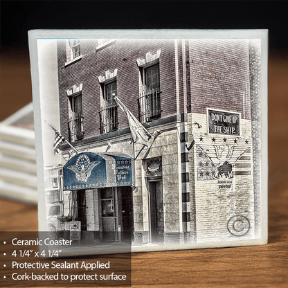 Founding Fathers Coaster - Ceramic Home Decor featuring a historic Buffalo pub with patriotic flags and signage. Durable, cork-backed for surface protection.
