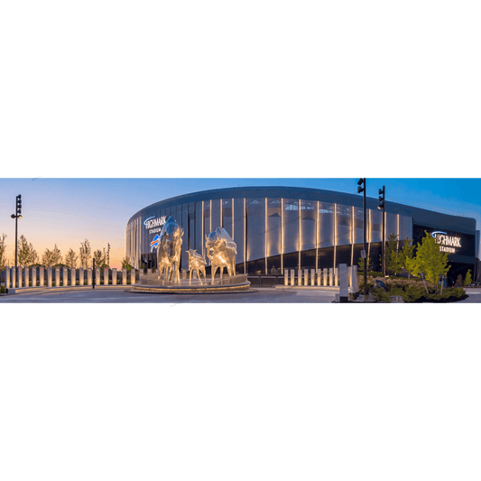 Highmark Stadium panorama photo art print showcasing the modern exterior with illuminated vertical lines and Buffalo Bills statues at dusk