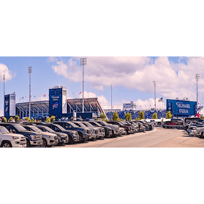 Buffalo Bills Stadium Print - Highmark Art shows a panoramic daytime view of Highmark Stadium with parked cars and blue skies. Ideal wall art for football fans.
