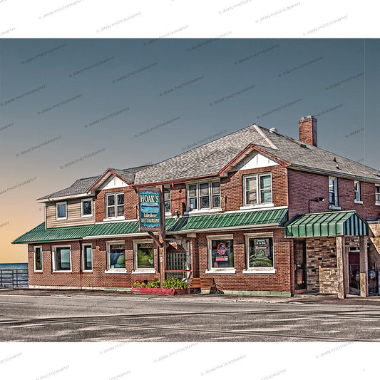 Frontal view of Hoaks Restaurant building with green roof and brick exterior, used in the Steampunk Table Lamp design for unique home lighting.