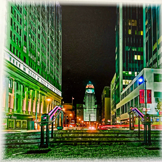Buffalo Lafayete Square City street at night with tall buildings and city hall illuminated tower.