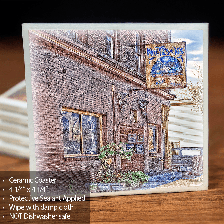 Nietzsche Ceramic Coaster featuring a photographic image of a historic Buffalo building with a cork backing, ideal for home decor and barware use.