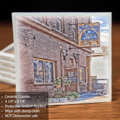 Nietzsche Ceramic Coaster featuring a photographic image of a historic Buffalo building with a cork backing, ideal for home decor and barware use.