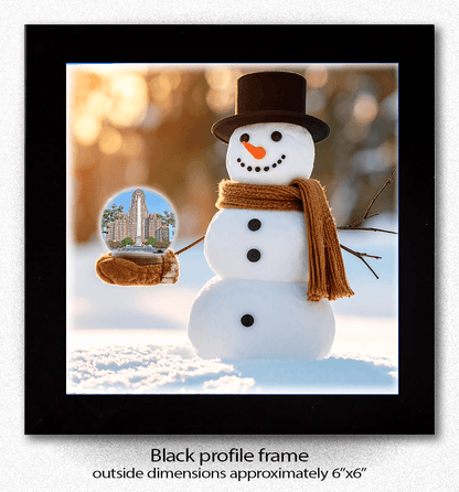 Snowman Globe Coaster Buffalo features a smiling snowman holding a globe with Buffalo NY's City Hall & McKinley Monument in a black profile frame.