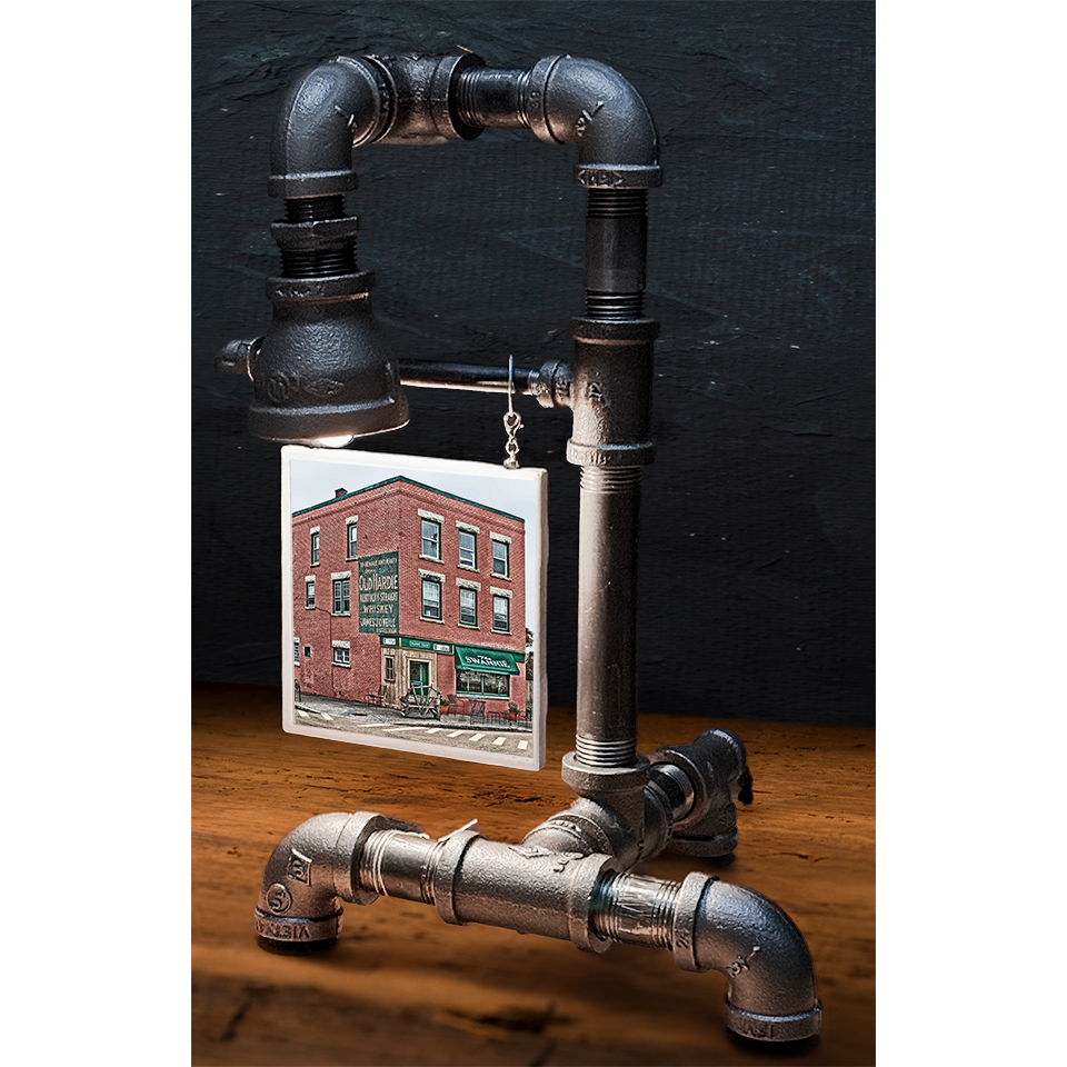 Custom pipe lamp with black industrial piping and a 4x4 tile image of a brick building with storefront, perfect for home decor