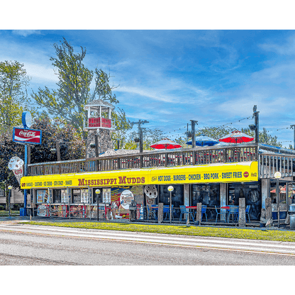 Tonawanda photo of Mississippi Mudds art print restaurant with bright yellow signage and rooftop seating, capturing nostalgic Buffalo wall art landmark charm.