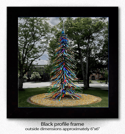 Framed Ski Tree Coaster Ellicottville print featuring summer sculpture in Ellicottville, NY. Black profile frame with approx. 6x6 inch dimensions.