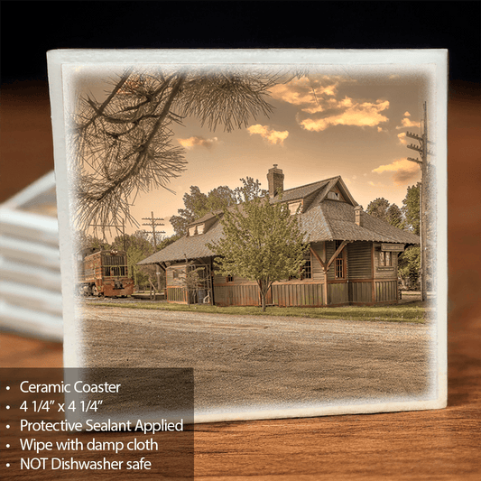 Williamsville Train Depot Coaster with ceramic finish and cork backing, featuring a vintage photo by Jman Photography. Ideal for protecting surfaces.