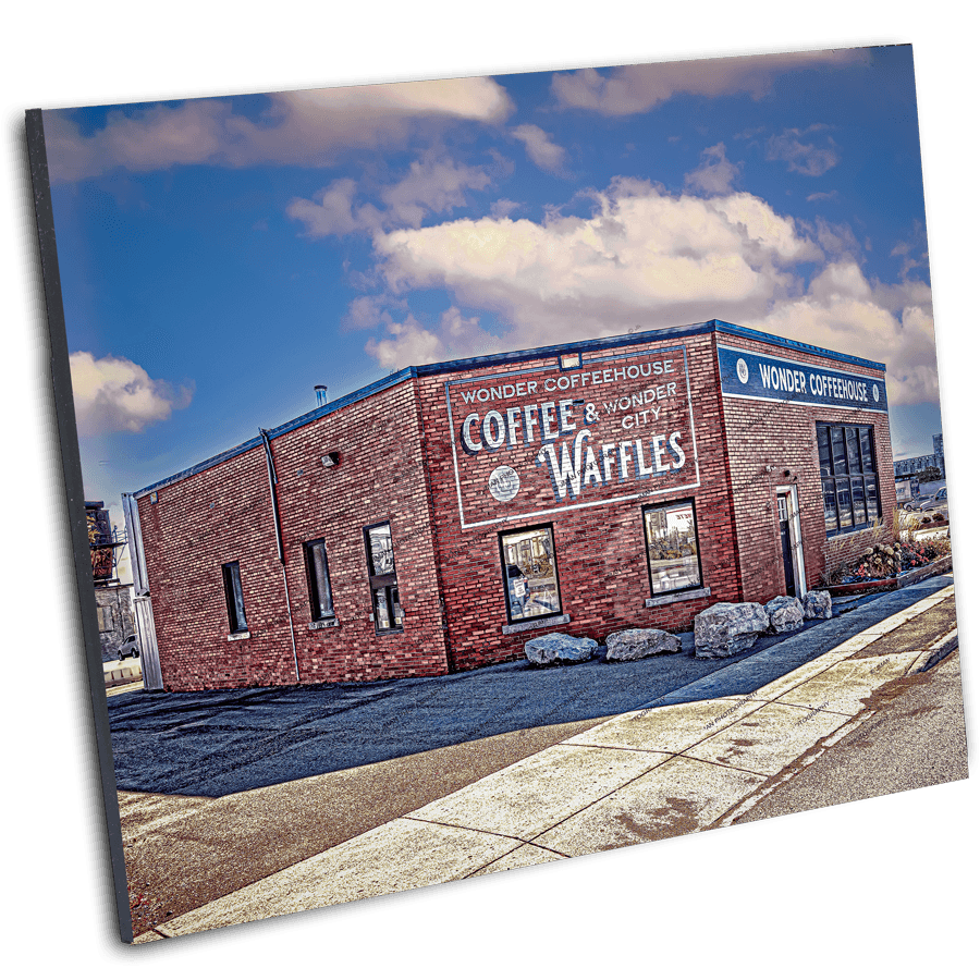 Wonder Coffee House photo featuring a red brick building with vintage signage in Buffalo, NY. Ideal wall art for fans of Liege waffles and local charm.